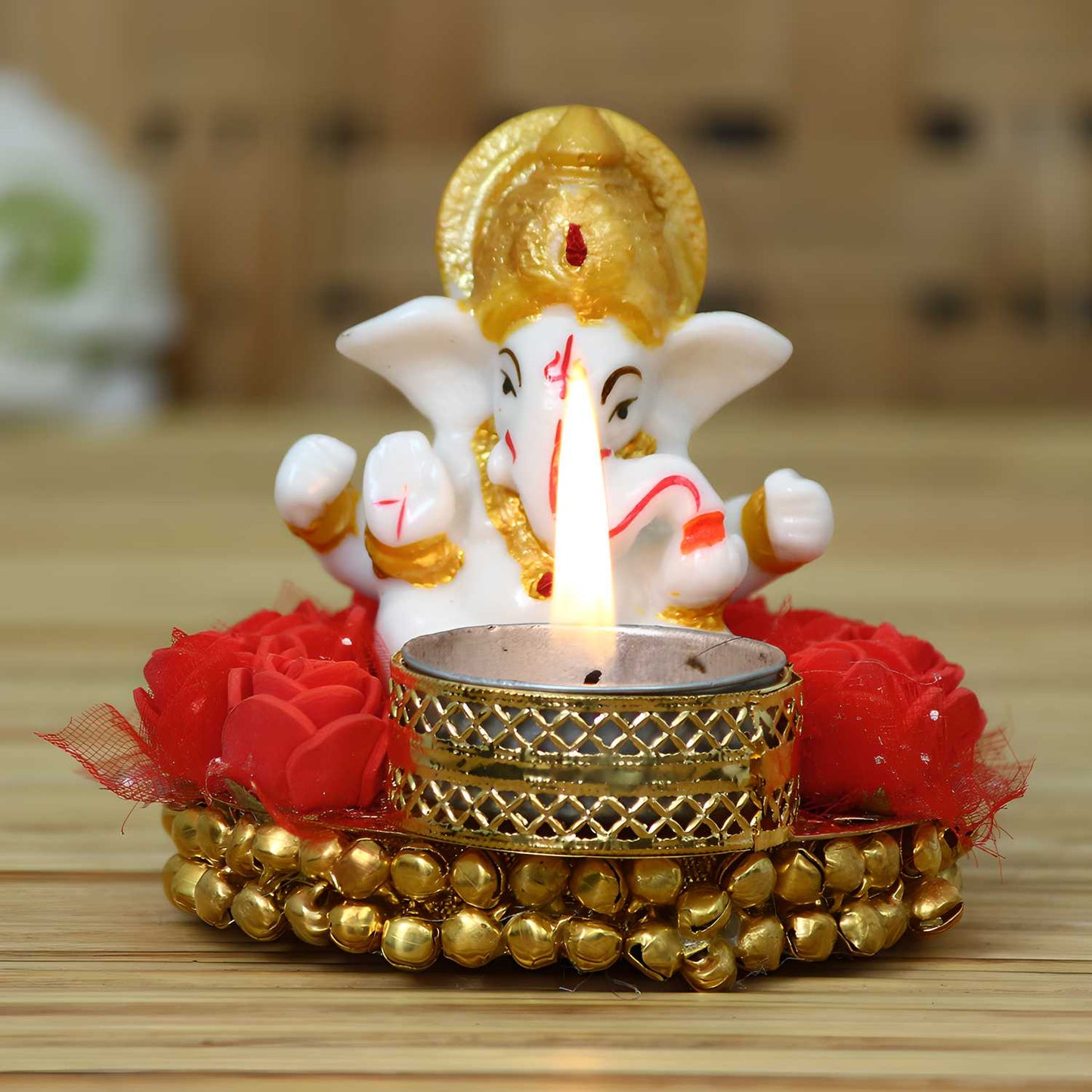 Lord Ganesha Idol on Decorative Plate with Light Holder